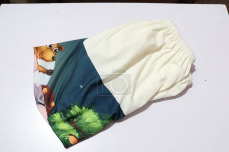 Photo for Closeup view of colorful cloth with animal pictures - Royalty Free Image