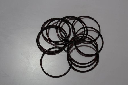 Photo for Group of black bracelets on white - Royalty Free Image