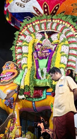 Photo for People worhsiping sacred Hindu God idol decorated with floral garland, Arunachalesvara Swamy Temple Karthika Deepam Festival at Thiruvannamalai in Tamil Nadu, India - Royalty Free Image