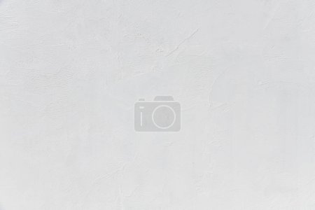 Foto de Fondo de pared de estuco blanco. Textura de pared de cemento pintado blanco - Imagen libre de derechos