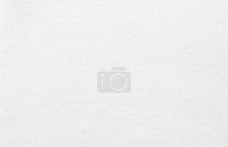 Foto de Tejido blanco textil o textura de fondo de cerca en su superficie - Imagen libre de derechos