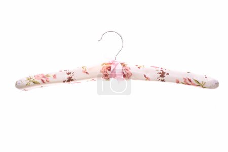 Soft fabric hanger with floral pattern isolated on white background.