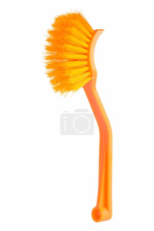 Orange brush with long handle isolated on white background.