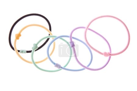 Set of thin multi-colored hair elastic bands isolated on white background.