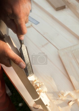 Photo for Working with chisel. Joiner's (carpenter's) tools. Woodworking instruments. Close-up. - Royalty Free Image