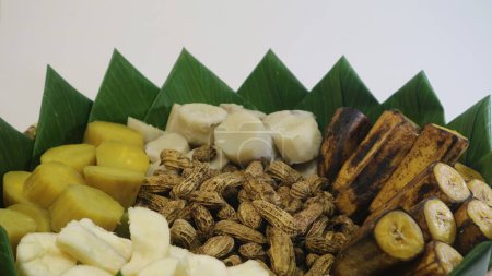 Polo pendem is Javanese traditional food including cassava, sweet potatoes, peanuts, ose, banana with red white ribbon flag. Usually used for Indonesia indpendence day celebration