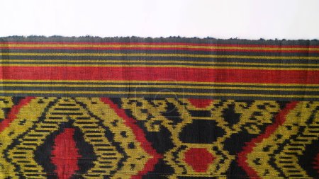 Handmade woven with unique pattern from Indonesia, textured multicolor ethnic fabric background