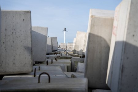 Photo for Breakwater made of large square concrete blocks - Royalty Free Image