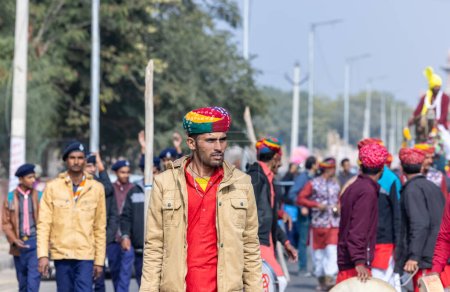 Téléchargez les photos : Bikaner, Rajasthan, India - January 2023: Camel Festival, Portrait of an young male wearing turban. Rajput male of bikaner. - en image libre de droit