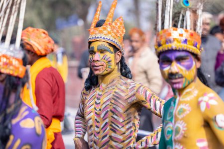 Photo for Bikaner, Rajasthan, India - January 2023: Camel festival, Portrait of an male artist with painted face and fantasy look while participating in camel festival parade at bikaner. Selective focus. - Royalty Free Image