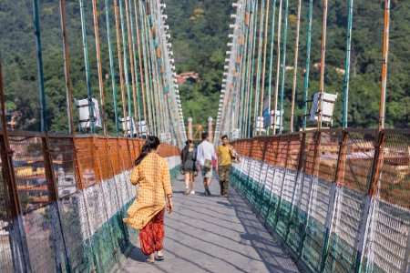 Photo for Rishikesh, Uttarakhand, India - October 2022: Holy Rishikesh, Portrait of unidentified brahmin male near river ganges ghat in rishikesh during winter morning. - Royalty Free Image
