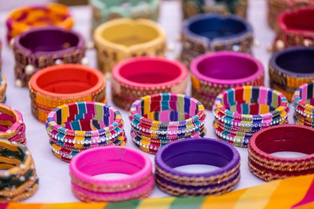 Photo for Indian traditional ethnic colorful bangles jewellery over plain background, Selective focus. - Royalty Free Image