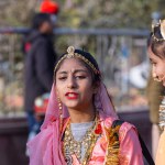 Bikaner, Rajasthan, India - January 13 2023: Camel Festival Bikaner, Group of young beautiful girls in traditional rajasthani dress and jewellery while participating in the parade. Selective focus.