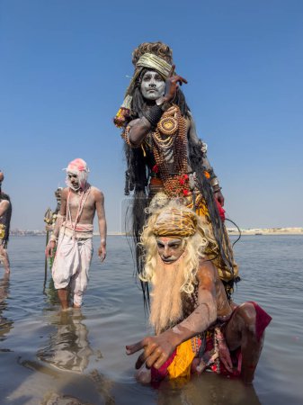Photo for Varanasi, Uttar Pradesh, India - March 03 2023: Masan Holi, Portrait of an male artist with painted face act as lord shiva during the celebration of masaan holi at harishchandra ghat in varanasi. - Royalty Free Image