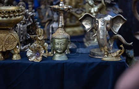 Brass metal art, Handmade Indian cultural sculpture souvenir made with brass with plain background. Selective focus.