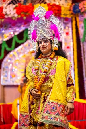 Photo for Ghaziabad, Uttar Pradesh, India - September 27 2022: Artist playing laxman character of ramayana in ramlila during the dussehra festival. - Royalty Free Image