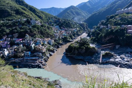 Photo for Confluence of Alaknanda and Bhagirathi rivers at devprayag in uttarakhand which forms holy river ganges. Uttarakhand is also knows as dev bhumi and famous among tourists. - Royalty Free Image