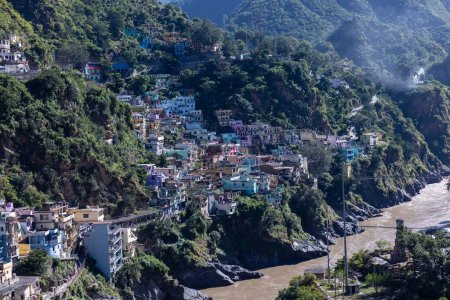 Photo for Devprayag, Uttarakhand, India - October 10, 2022: Landscape of mountains and buildings at devprayag with confluence of river - Royalty Free Image