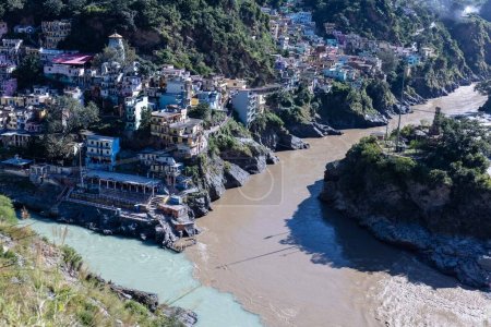 Photo for Confluence of Alaknanda and Bhagirathi rivers at devprayag in uttarakhand which forms holy river ganges. Uttarakhand is also knows as dev bhumi and famous among tourists. - Royalty Free Image