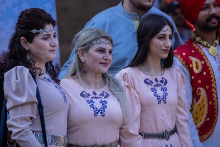 Photo for Faridabad, Haryana, India - February 04, 2023: Portrait of beautiful girls from Armenia country during a performance at surajkund craft fair. People from different countries participate in fair - Royalty Free Image