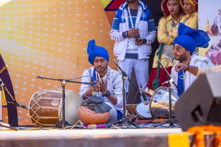 Photo for Faridabad, Haryana, India - February 04 2023: Portrait of male artists from haryana while performing at surajkund craft fair - Royalty Free Image