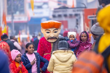Photo for Ghaziabad, Uttar Pradesh, India - January 28 2024: Portrait of hindu devotees participating in rath yatra of lord jagannath and chanting krishna. - Royalty Free Image