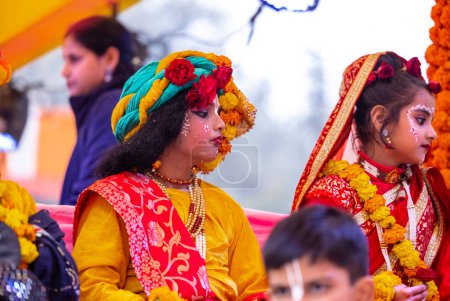 Photo for Ghaziabad, Uttar Pradesh, India - January 28 2024: Portrait of beautiful young kids dresses as hindu gods during the rath yatra organised by iskon group for lord jagannath. - Royalty Free Image