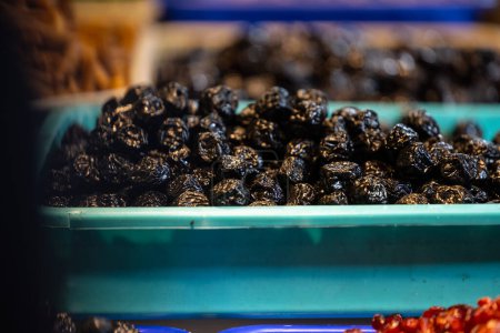 Photo for Colourful blackberry fruits for sale on display at trade fair. - Royalty Free Image