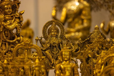 Brass metal art, Handmade Indian god Krishna sculpture souvenir made with brass with blur background. Selective focus.