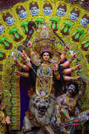 Photo for Subho mahalaya, An idol of Goddess Durga decorated in Pandal. Durga Puja is biggest religious festival of Hinduism and for bengalis and is now celebrated worldwide. - Royalty Free Image
