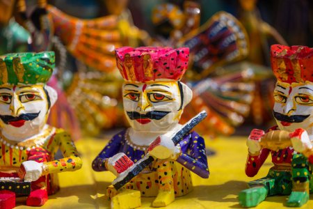 Photo for Handmade wooden toys, Handmade colourful rajasthani toys of human made with wooden at surajkund craft fair. . Selective focus. - Royalty Free Image