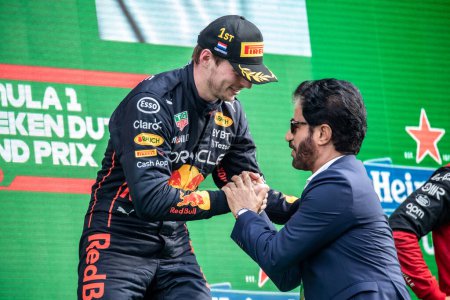 Photo for Zandvoort, Holland. 1-4 September 2022. F1 World Championship, Dutch Grand Prix. Race day. #1, Max VERSTAPPEN, NDL, Oracle Red Bull Racing RB18 Honda, race winner, congratulated by Mohammed Bin Sulayem FIA President. - Royalty Free Image