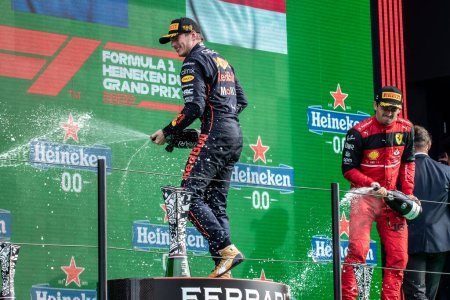 Photo for Zandvoort, Holland. 1-4 September 2022. F1 World Championship, Dutch Grand Prix. Race day. #1, Max VERSTAPPEN, NDL, Oracle Red Bull Racing RB18 Honda, race winner, celebrates on the podium with Charles Leclerc, Ferrari. - Royalty Free Image