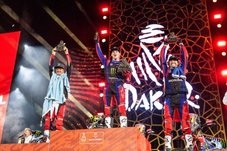 Photo for Yanbu, Saudi Arabia. 05-19 Jenuary 2024. #9, Ricky Brabec Honda CRF450 Rally, Monster Energy Honda Team, celebrating the victory on the podium with Ross Branch and Adrien Van Beveren. - Royalty Free Image