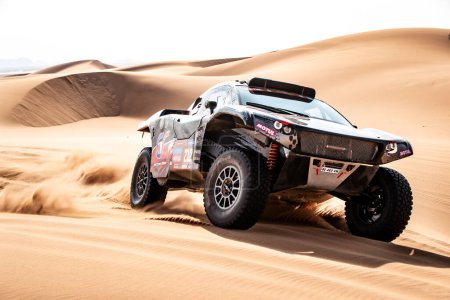 Photo for Yanbu, Saudi Arabia. 05-19 Jenuary 2024. 46 Rally Dakar. #212, Mathieu Serradori  Loic Minaudier - Century CR6-T, in the dunes. - Royalty Free Image
