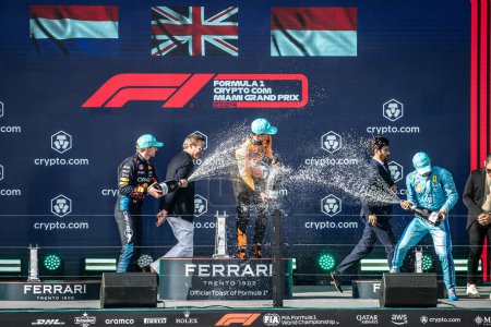Photo for Miami, FL, USA. 02-05 May 2024. Formula 1 World Championship. Formula 1 Crypto.com Miami Grand Prix. Sunday. Lando Norris, Mclaren, winner of the race, on the podium with Verstappen and Leclerc. - Royalty Free Image