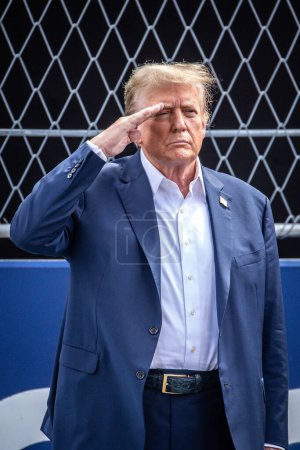 Photo for Miami, FL, USA. 02-05 May 2024. Formula 1 World Championship. Formula 1 Crypto.com Miami Grand Prix. Sunday. Donald John Trump, American politician, media personality, and businessman who served as the 45th president of the United States, on starting - Royalty Free Image
