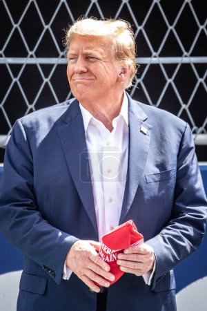 Photo for Miami, FL, USA. 02-05 May 2024. Formula 1 World Championship. Formula 1 Crypto.com Miami Grand Prix. Sunday. Donald John Trump, American politician, media personality, and businessman who served as the 45th president of the United States, on starting - Royalty Free Image