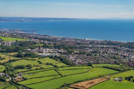 Aerial helicopter views over Swansea, Mumbles and the Gower Peninsular, Wales,UK