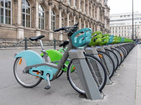 Rental bicycles in Paris, France. Row of the city bikes for rent.