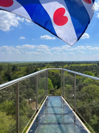 Photo for View from the bosbergtoren and a frisian flag in appelscha, Friesland the Netherlands - Royalty Free Image