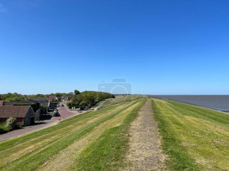 Path on the dyke around Wierum in Friesland the Netherlands