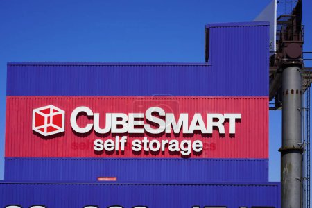 Photo for Bronx, NY - April 9, 2023 : CubeSmart self storage and logistics logo billboard on New York City warehouse. - Royalty Free Image