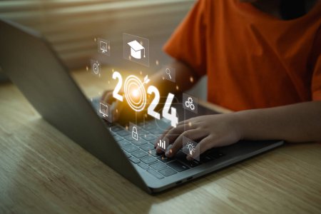 Photo for 2024 new year trends technology concept. Girl working on laptop virtual display screen of graduation hat, education icons. E-learning Education webinar online courses . Education idea learning online. - Royalty Free Image