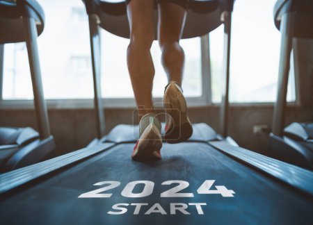 Photo for Happy new year 2024,2024 symbolizes the start of the new year. Close up of feet, sportsman runner running on treadmill in fitness club. Cardio workout. Healthy lifestyle, guy training in gym. - Royalty Free Image