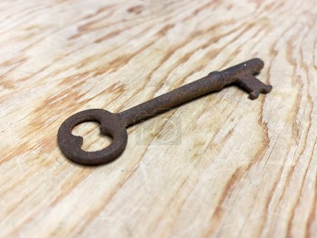 Photo for A rusty skeleton key iron retro vintage antique old-fashioned house door passkey - Royalty Free Image