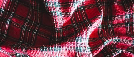 Photo for A wriggled red plaid knitted fabric textile kitchen towel material - Royalty Free Image