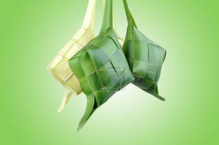 Photo for Ketupat is a traditional food from Indonesia made of rice wrapped in coconut leaves - Royalty Free Image