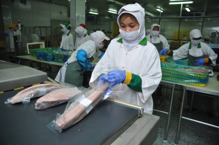 Photo for Jakarta, Indonesia - May 26, 2017 : Tuna processing activities at Muara Baru port, Jakarta, Indonesia - Royalty Free Image