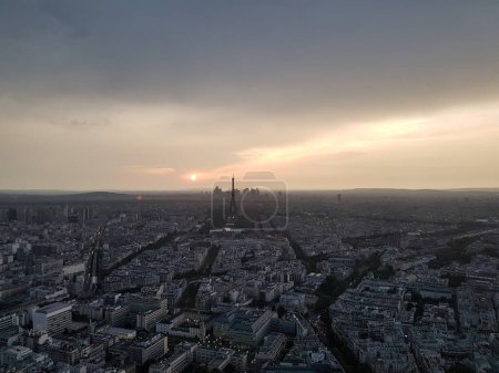 Photo for Paris panorama from above with Eiffel Tower and La Defense skyscrapers on the background at sunset time - Royalty Free Image